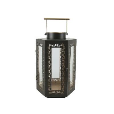 China Black Metal Creative Hexagon Outdoor Glass Lantern Home Decor Iron Home Decor Daily Sconce Lantern for sale