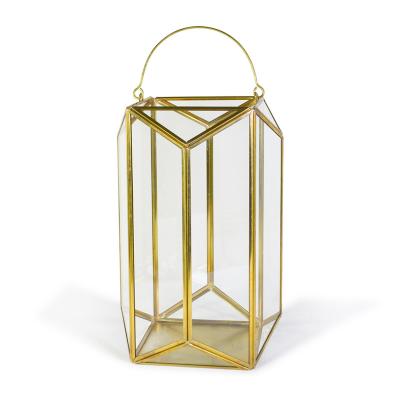 China Morden Big 8 Color Sided Portable Glass Candle Lantern European Creative Wind Greenhouse Lamp Home Golden Lantern for sale