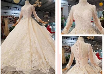 Chine Nouvelle robe de mariage de remorquage à manches longues en cristal de luxe de couleur champagne fabriquée à la main de dentelle en automne et hiver à vendre