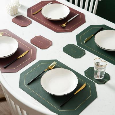 China Sustainable Luxury PU Place Mat Custom Color Leather Octagonal Table Mat Placemats for sale