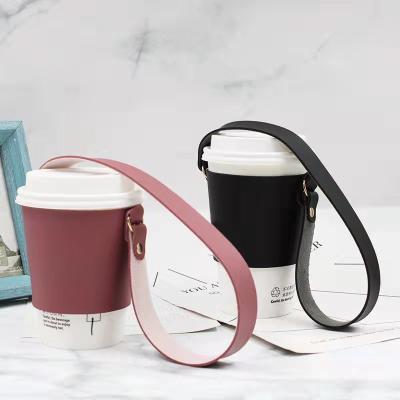 China Outdoor Portable Heat Insulation Coffee Cup Cover Drink Holder PU Leather Cup Sleeve Outdoor Portable Hot Sleeve for sale