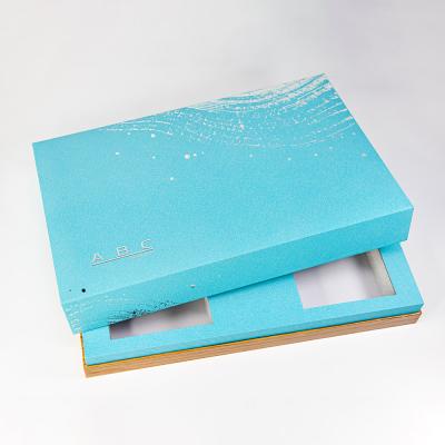 China Logo Luxury Blue Rigid Paper Recyclable Custom Cardboard Cosmetic Packaging Lid And Gift Box Based With Foam for sale