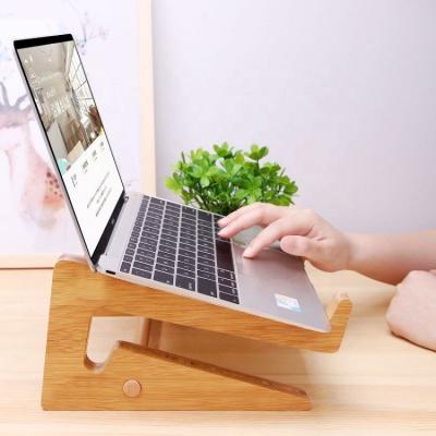 China Adjustable (Height) Bamboo Stand Cooler Pad Wooden Laptop Desktop Riser Cooling CPU Heat Dissipation Shelf for sale