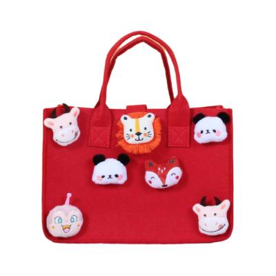 China New Fashion Cute Cartoon Figure Felt Handbag Doll Bag Large Capacity Decorative Tote Bag For Children for sale