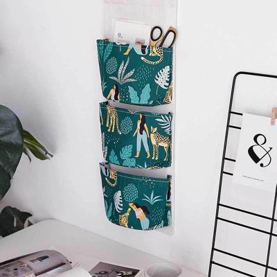 China Nordic Viable Cotton Canvas Storage Wall Door Storage Toys Hanging Storage Bag Makeup Cabinet Instrument Organizer for sale