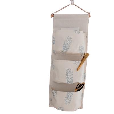 China High Quality Viable Pe Bag Door Storage Waterproof Wall Storage Bag Hanging Organizer with 3 Pockets for sale