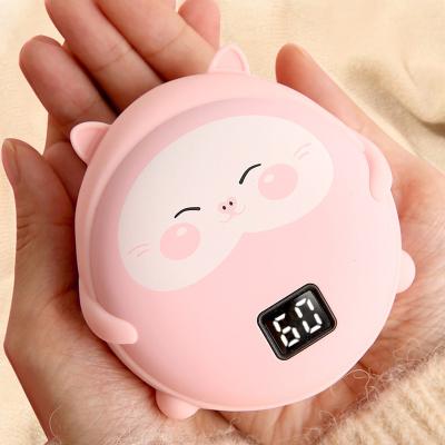 China Energy Saving Warm Sale Winter Power Bank Hand Warmer Charing Disposable OEM Kids Cute Football Hand Warmers Custom for sale