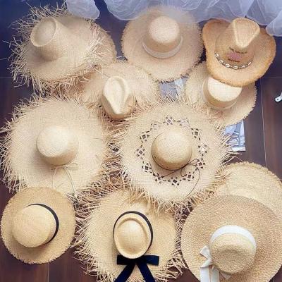 China Wholesale Custom Logo Striped Summer Raffia Straw Hat Women Beach Big Wide Brim Hat Seaside Vacation Sharpening Panama Fedora Hats for sale