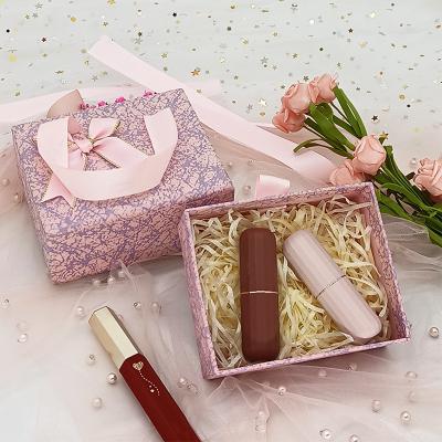 China Custom Recyclable CMYK Logo Slide Out Box With Ribbon Carry Handle, Cardboard Drawer Box For Perfume And Cosmetic Packaging for sale