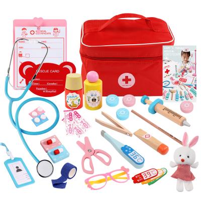 China Eco-friendly material customized children's simulation cloth bag medicine box medicine box baby boy and girl wooden doctor injection toy gift for sale