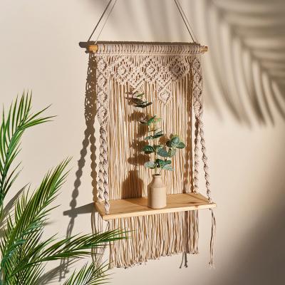 China Yunxin Cotton Macrame Wall Hanging Rustic Handmade Natural Shelf For Plants And Ornaments Hanging Wall Boho Woven Plant Hanger for sale