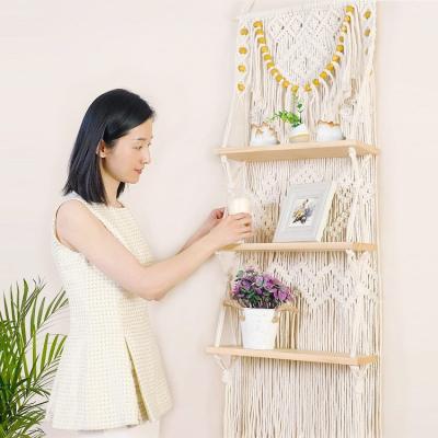 China Upgraded Rustic 3 Tier Macrame Shelves With Wooden Beads Boho Handmade Decorative Floating Shelf Display Rack To Organize And Decor for sale