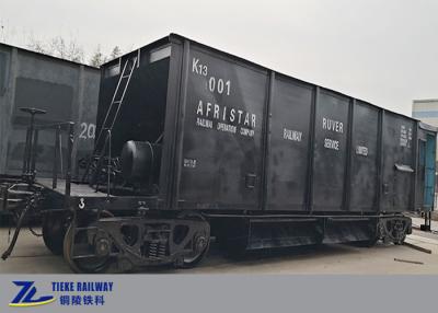 China Los carros ferroviarios cubiertos de la tolva del mineral de hierro 60 toneladas cargan estándar del EN de UIC en venta