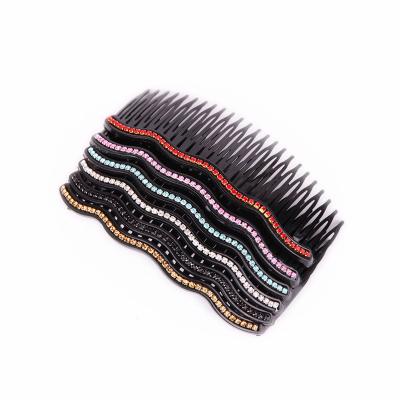 China Fashion 24 Tooth Diamond Studded Plastic Insert Black Waterproof Hair Comb Hits Wed Hair Comb for sale