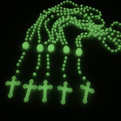 China Wholesale CLASSIC luminous plastic necklace style bead rosary catholic religious luminous cross necklace for sale