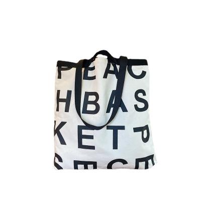 China arming & Korean disarmament the same three-color wholesale letter logo style large-capacity shopping bag canvas idler bag for sale