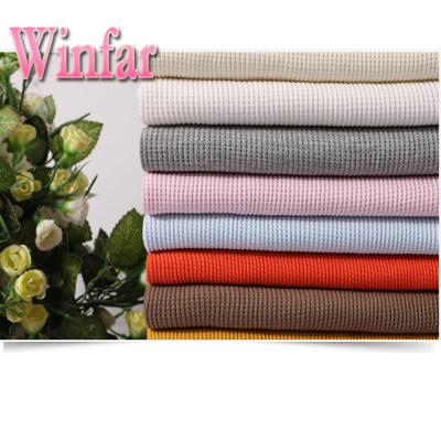 China Shaoxing Strong Wicking Textile Polyester Anti-Static Waffle Dyed Fabric For Bathrobe Garment for sale