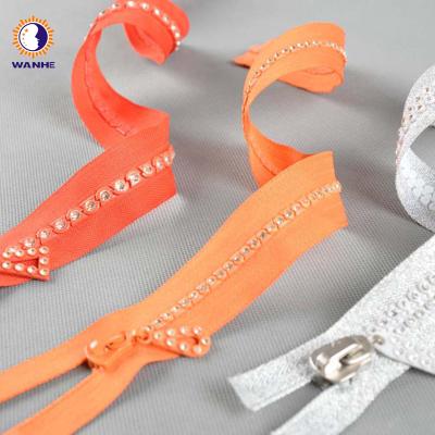 China Reversible Fancy Large Diamond Decorative Zipper for sale