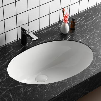 China Easy Clean Wholesale Ceramic Hand Wash Basins Sink Hotel Decor Under Counter Wash Basin for sale