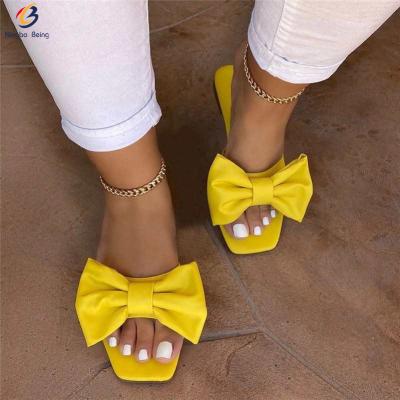 China CUSHIONING Wholesale Ladies Flat Slippers With Woman Slippers Fashion Large Bow Sandals for sale