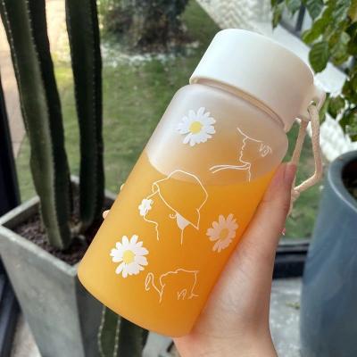 China Water Bottle Stocked With Rope Travel Tea Cup Small Frosted Portable Fashionable Daisy Transparent Plastic Water Bottles BPA Free Creative for sale