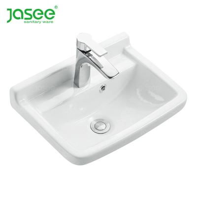 China Foshan Modern Ceramic Sanitary Ware White Artistic Bathroom Basin for sale