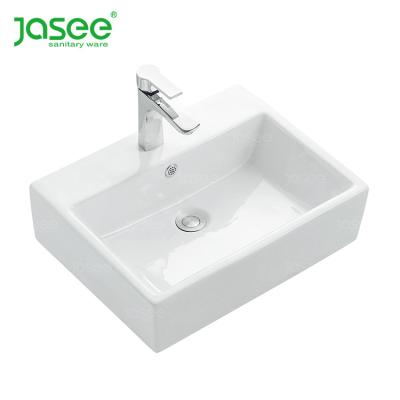 China Glassy Ceramic Sink Art New Basin Hair Wash Shampoo Fancy Design Glass Hook Bthroom Basin Cheap Model for sale