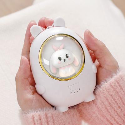 China Convenient YiPin 2023 OEM ODM Portable pocket Novelty Gift sets cute USB Rechargeable Hand Warmer custom power bank with mini Night Light for sale