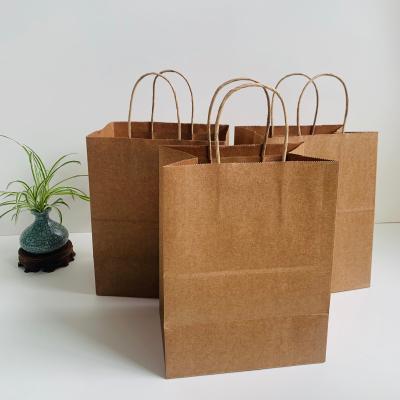 China New Type Recycled Materials High Quality Disposible Kraft Paper Bags With Handle 20*11*27cm Shopping Bags Handle Kraft Paper Bags for sale