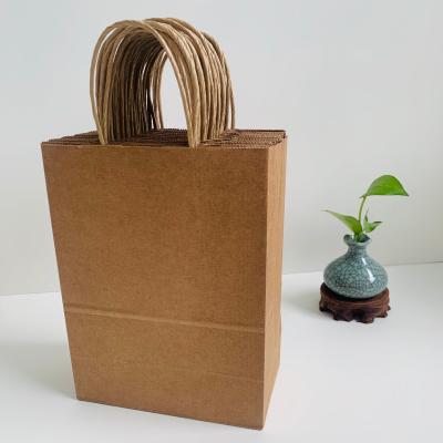 China Recycled Materials Shopping Bags Kraft Paper Disposible Paper Bags With Handle 20*11*27cm Shopping Bags Handle Kraft Paper Bags for sale