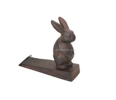 China Antique Cast Iron Brown Rabbit Door Stopper From Europe for sale