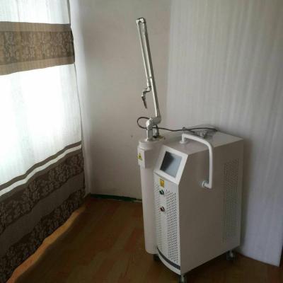 China 10600nm metal tube fractional co2 laser acne scars removal and vaginal rejuvenation for sale