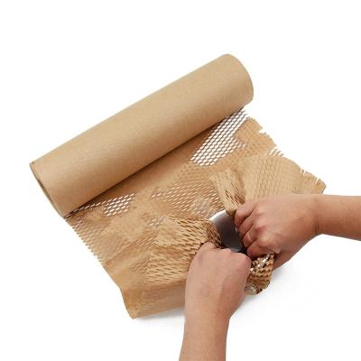 China Waterproof Protective Kraft Pad Pad Packing Machine Promotion Packing Honeycomb Filling Paper Roll for sale