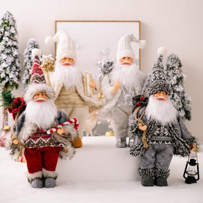 China New Christmas Festive Christmas Decorations Standing Pose With Lights Christmas Santa Claus Resin For Home Decoration for sale