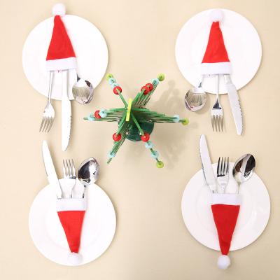 China Non-woven Christmas Home Decor Christmas Hat Knife and Fork Set Christmas Desk Decoration for sale