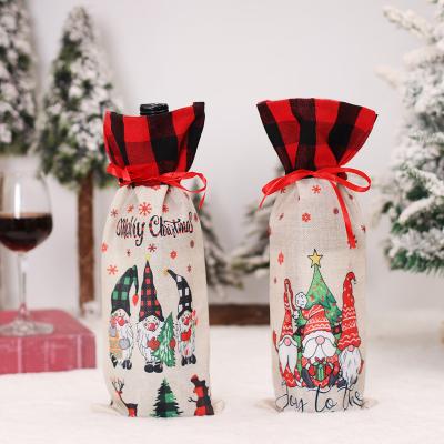 China New Novelty Christmas Decoration Plaid Burlap Christmas Wine Bottle Cover for sale