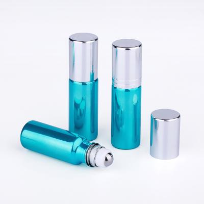 China Personal Care 5ml Mini Blue UV Essential Oil Bottle Roll On Perfume Bottles Glass Ball Roller Essential Oil Bottles for sale