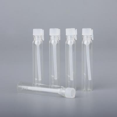 China MINI Popular Personal Care Clear Glass Perfume Sample Bottle Custom Printing White Vial 2ml Cap for sale