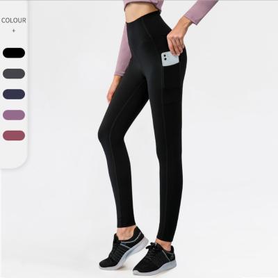 China 2021 New Arrivals Pockets Hot Gym Anti-Static Yoga Tights Long Sports Women Compression Pants Fitness Workout Tights Skinny Gaiters for sale