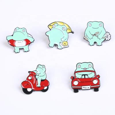 China Creative series cute brooch fabric decoration factory direct sales cartoon frog fun driving green frog badge animal brooch for sale