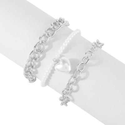 China Hot Selling Hiphop White Round Simulated Pearl Bracelet Set Vintage Wholesale New Cross Stackable Bracelet Sets for sale