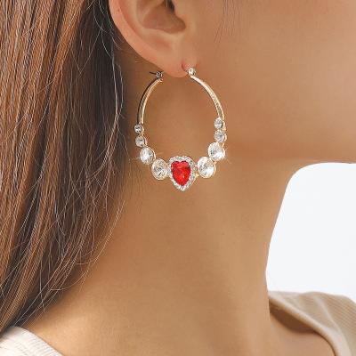 China Cute Fashion Jewelry Crystal Rhinestone Heart Earrings Romantic Small Gold Rhinestone Dangle Earrings for sale