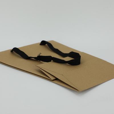 China Recyclable Wholesale Custom Printed Black Luxury Shopping Paper Gift Bag With Handle for sale