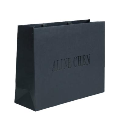 China Custom Personalized Printed Logo White Cardboard Shopping Gift Black Paper Bag Packaging Gift Bags Recycled Materials Manufacturer for Products for sale