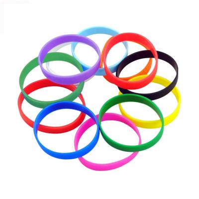 China Decorative Customizable Sport Kids Debossed Silicone Wristbands for sale