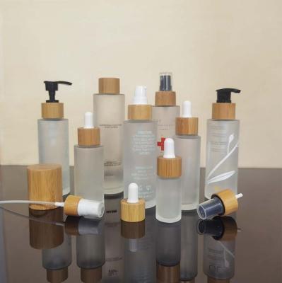 China Eco-friendly Empty Frosted Glass Cosmetic Spray Bottle For Skin Care 30ml 100ml Cosmetic Pump Lotion Bottle Glass Packaging for sale