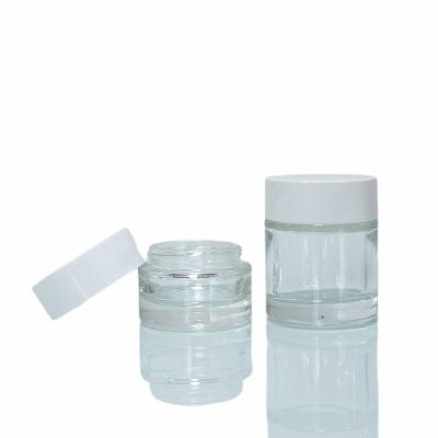 China Custom Thick Bottom Cosmetic Packaging 15g 50g Empty Transparent Round 0.5oz 1.7oz Cosmetic Glass Jar With Lid for sale