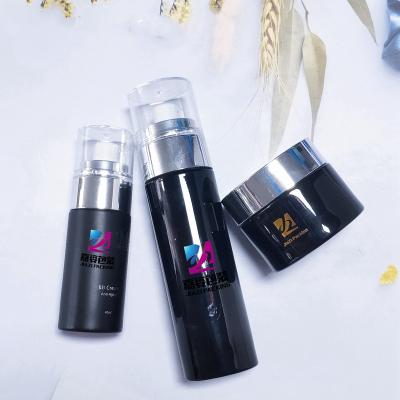 China Wholesale Luxury Dark Blue Cosmetic Lotion Cosmetic Glass Bottles With Gold Pump for sale