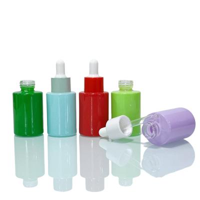 China Any Color Essential Oil Bottle 1oz 30ml Macaroon Color Dropper Glass Bottle for sale