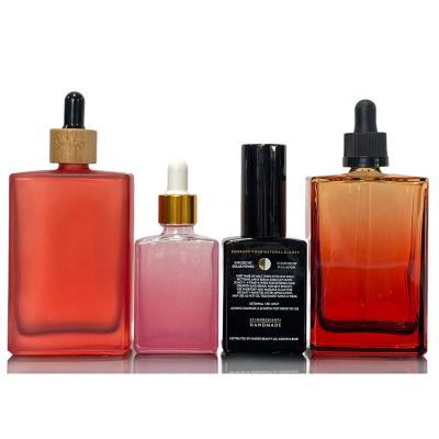 China Wholesale Cosmetic Square Dropper Bottle Transparent Amber Black Colored Glass Rectangle For Essential Oil Perfume 15ml 30ml 50ml 100ml for sale